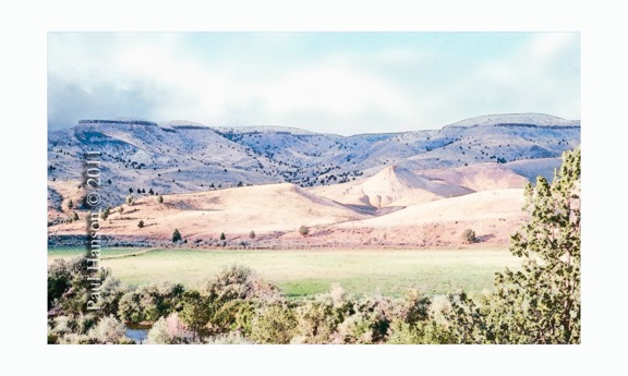Digital art print of a photo of the John Day Valley near Dayville, Oregon that has been manipulated to give it a lithographic look.  Printed on archival, high quality paper with archival quality inks.